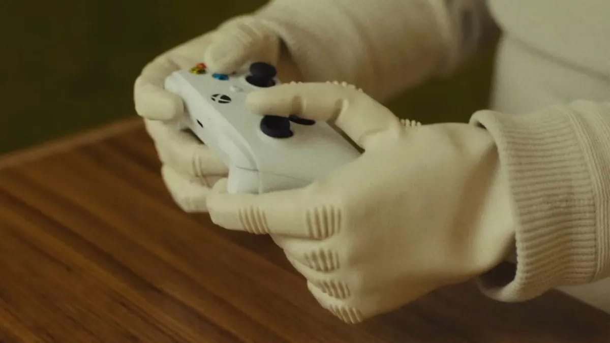 Susipažinkite su NEO: 20 000 dolerių kainuojančiu robotu, kuris žaidžia Xbox, atidaro traškučius ir atitraukia džemperio užtrauktuką